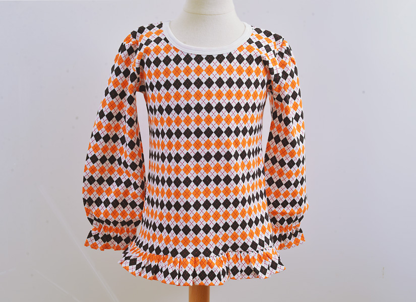 Long Sleeve Girl Ruffle Shirt. Orange & Black Argyle