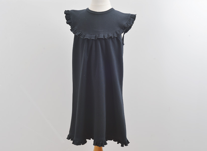 Blank, classic dress, sleeveless style. Black color.